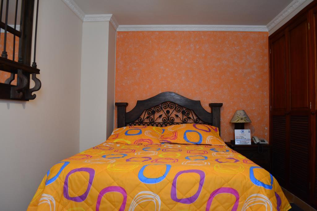 Hotel Casa Colonial Santa Rosa De Cabal Habitación foto
